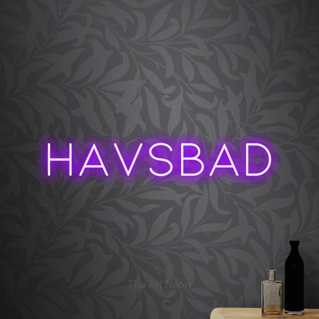 LED neon sign reading “havsbad”, arranged in a single line.