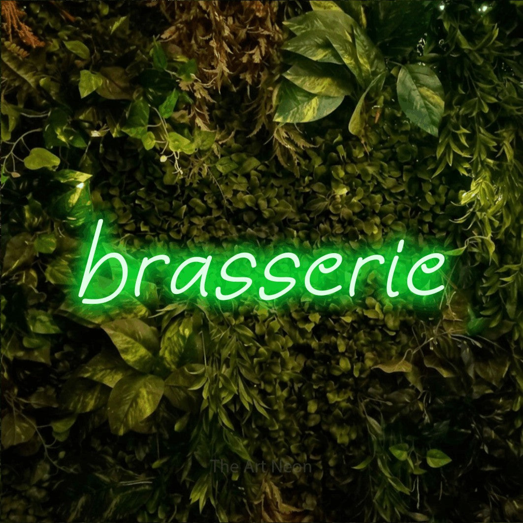 LED neon sign reading “brasserie”, arranged in a single line.