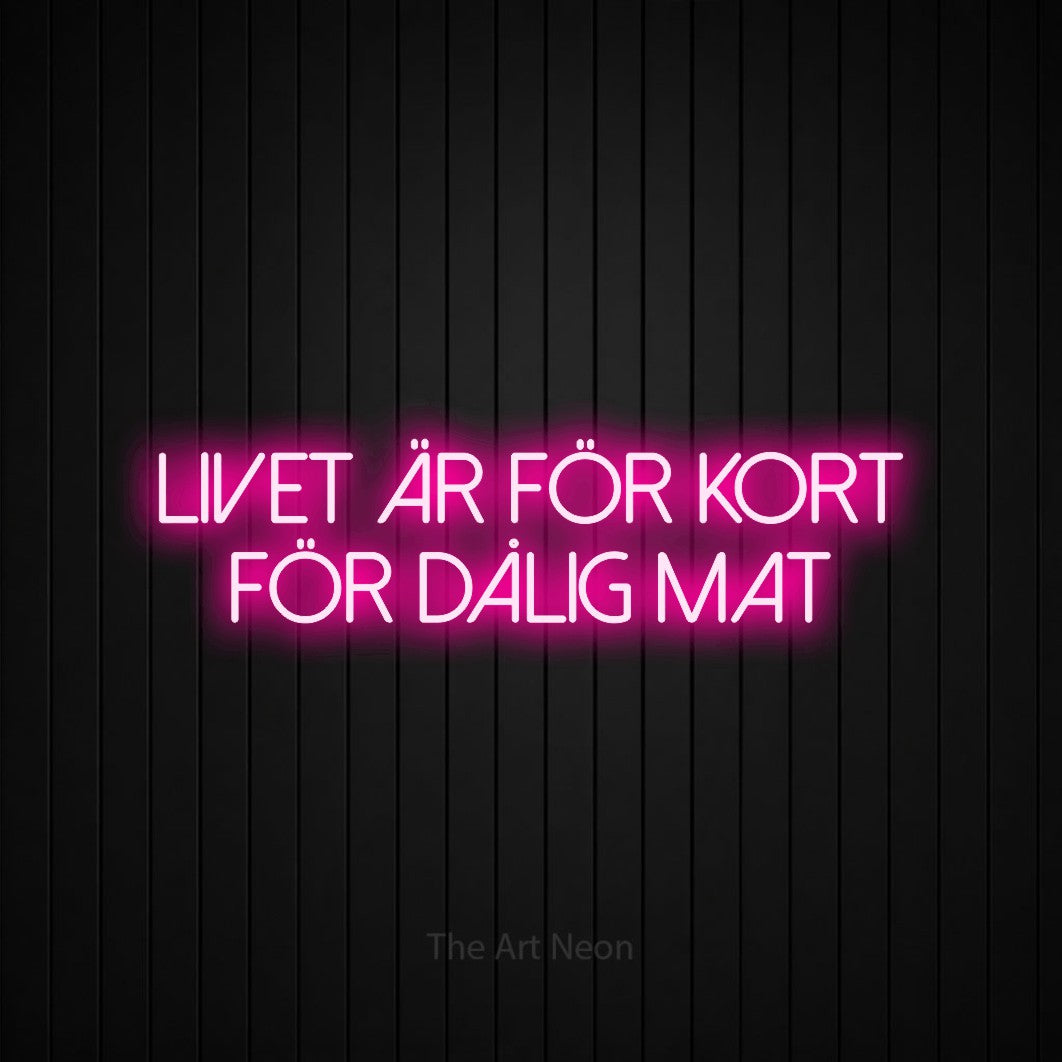 LED neon sign reading “Livet Är För Kort För Dålig Mat”, arranged in 2 lines.