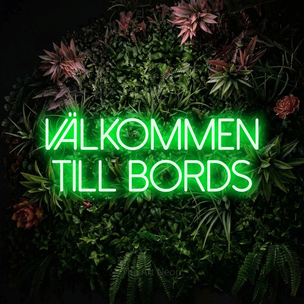 LED neon sign reading “VÄLKOMMEN TILL BORDS”, arranged in 2 lines.