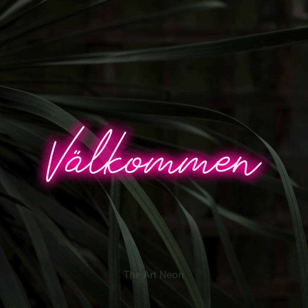 LED neon sign reading “Välkommen”, arranged in a single line.