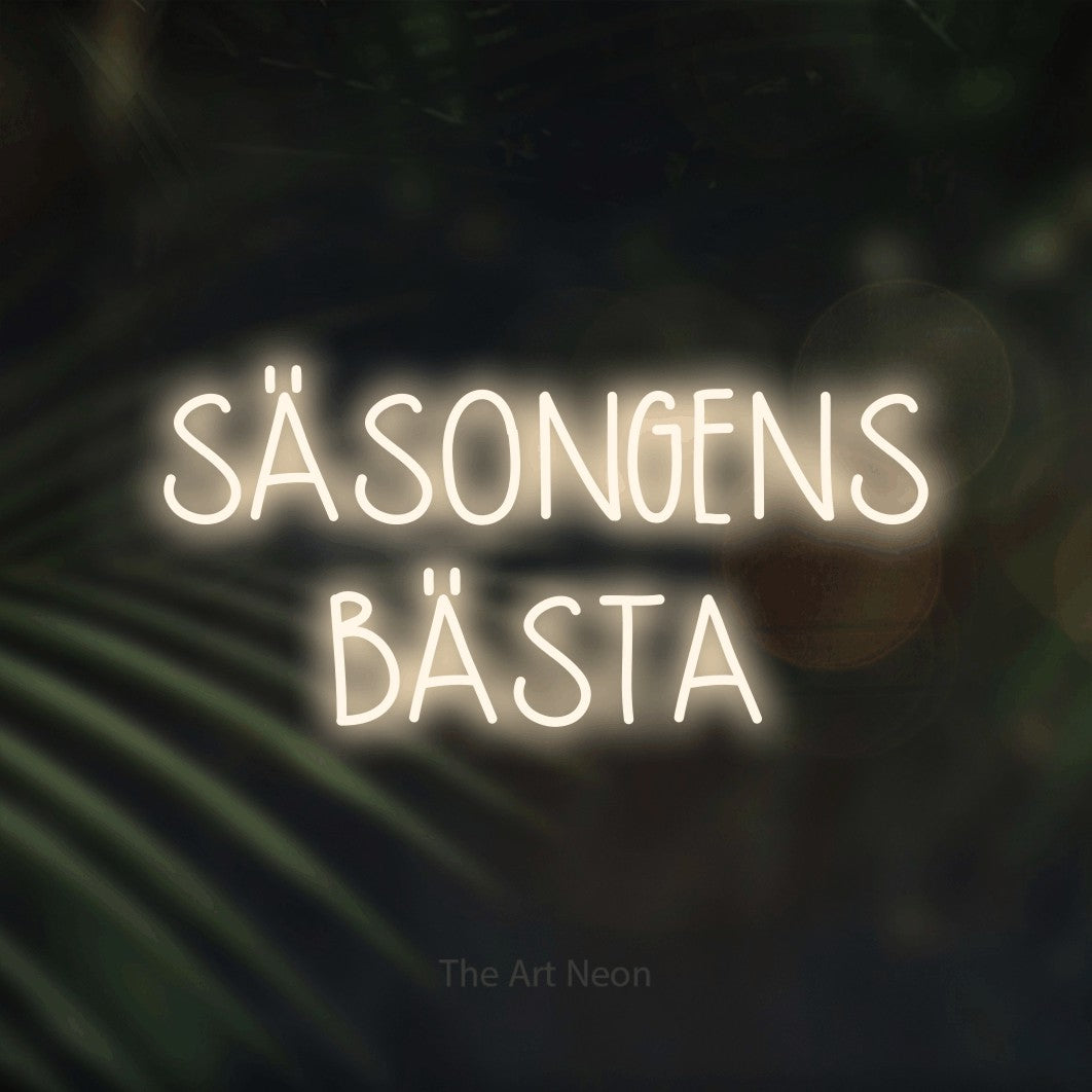 LED neon sign reading “SÄSONGENS BÄSTA”, arranged in 2 lines.