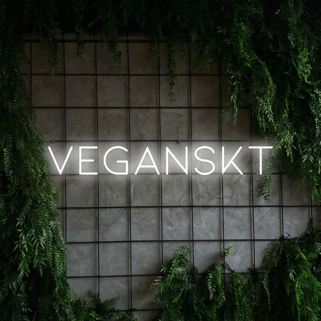 LED neon sign reading “VEGANSKT”, arranged in a single line.