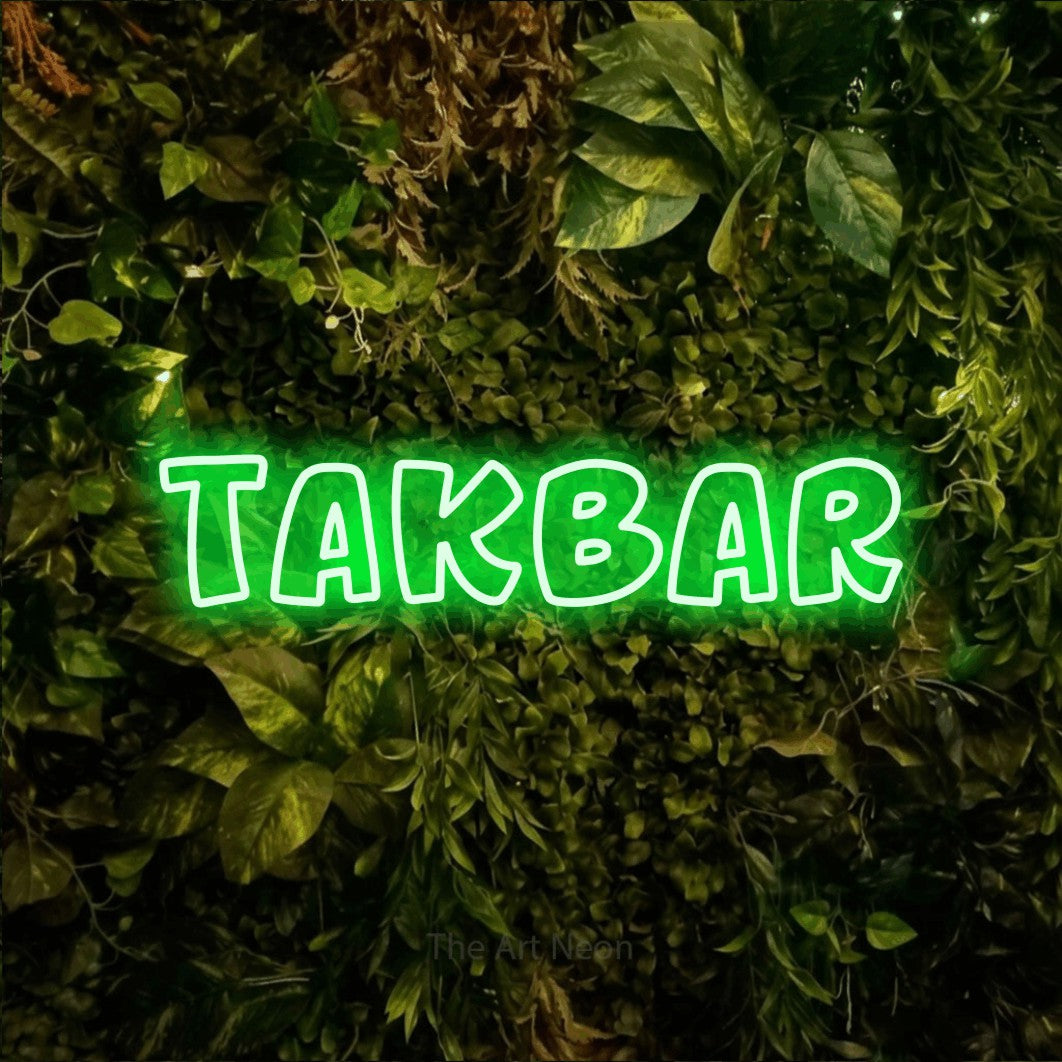 LED neon sign reading “takbar”, arranged in a single line.