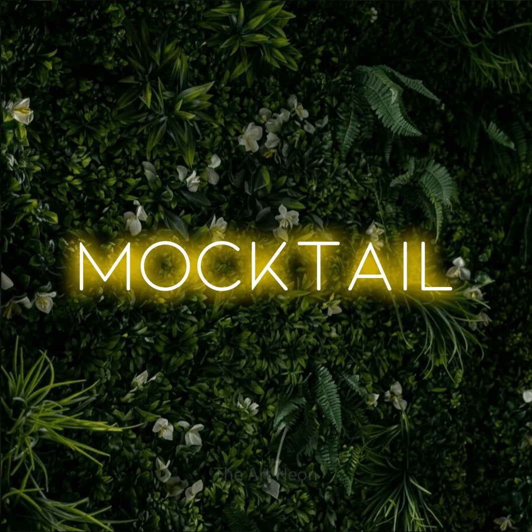 LED neon sign reading “MOCKTAIL”, arranged in a single line.