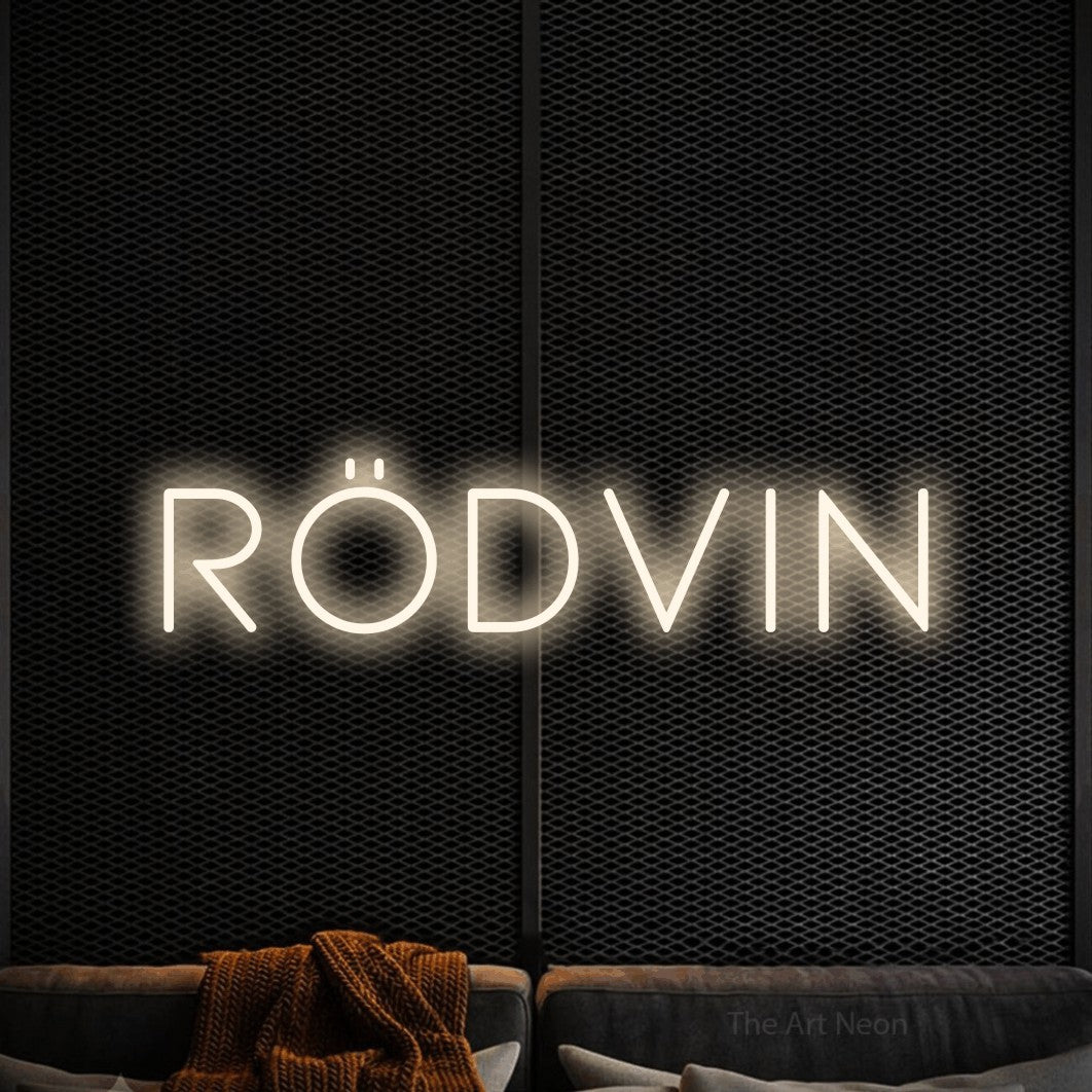 LED neon sign reading “rödvin”, arranged in a single line.