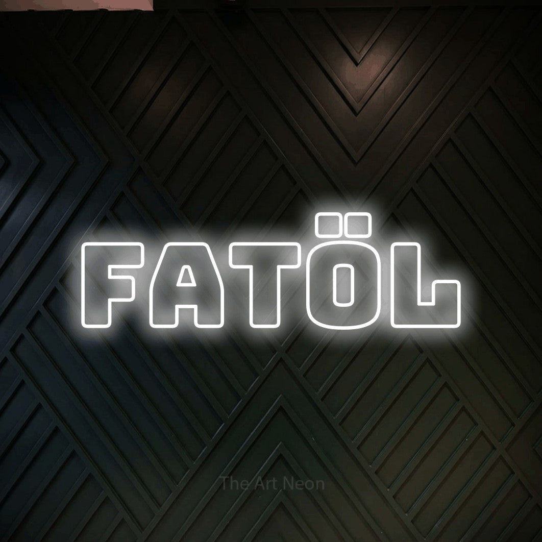 LED neon sign reading “fatöl”, arranged in a single line.