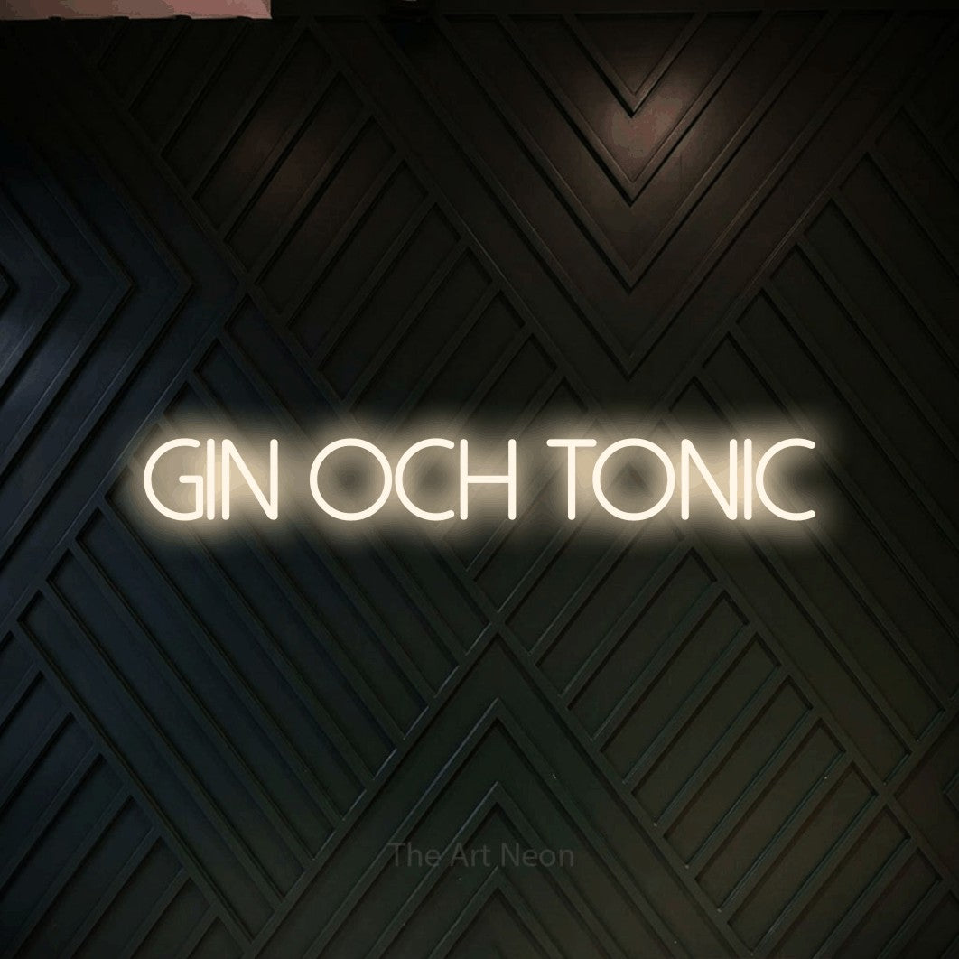 LED neon sign reading “gin och tonic”, arranged in a single line.