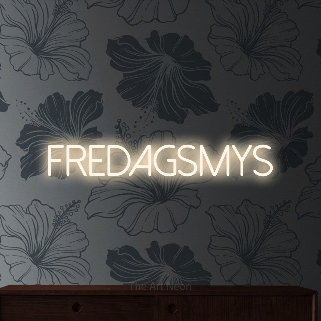 LED neon sign reading “FREDAGSMYS”, arranged in a single line.