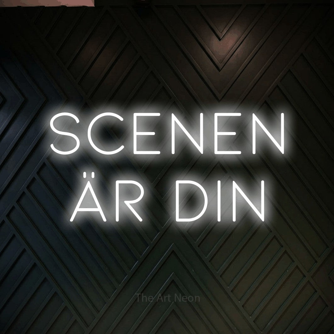 LED neon sign reading “SCENEN ÄR DIN”, arranged in 2 lines.