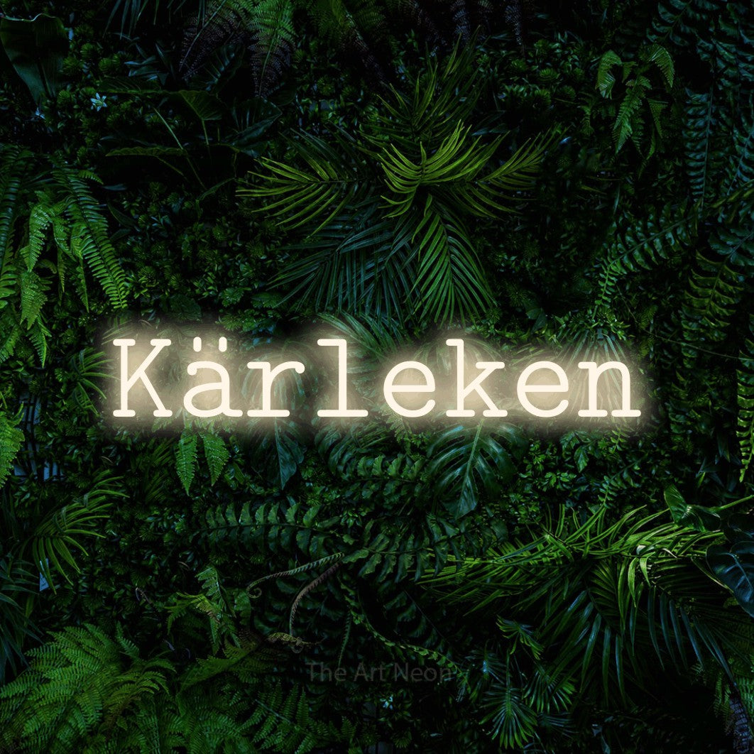 LED neon sign reading “Kärleken”, arranged in a single line.