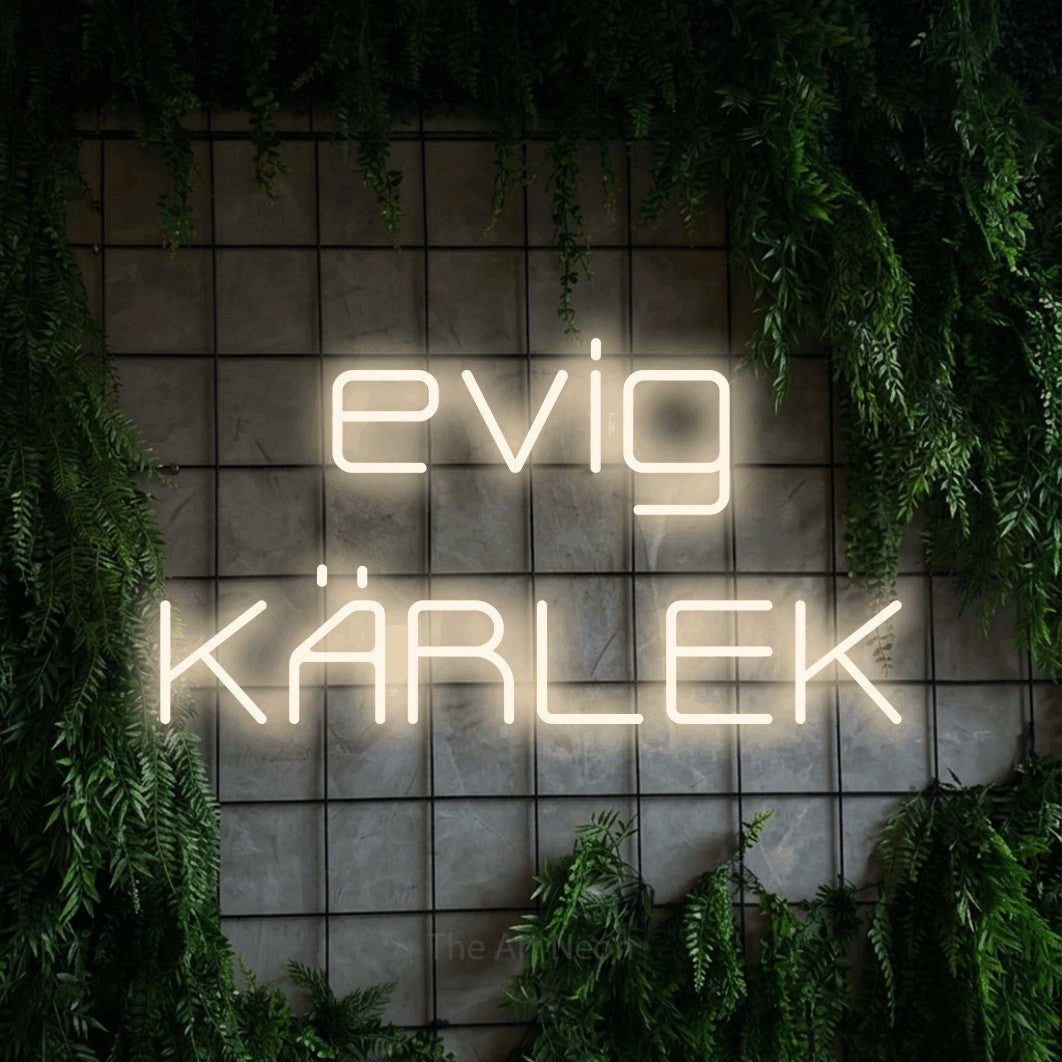 LED neon sign reading “evig KÄRLEK”, arranged in 2 lines.