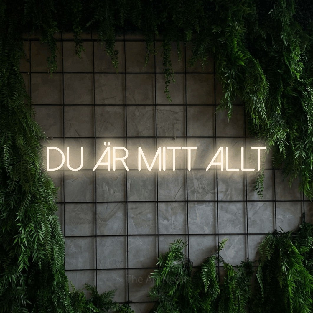 LED neon sign reading “DU ÄR MITT ALLT”, arranged in a single line.