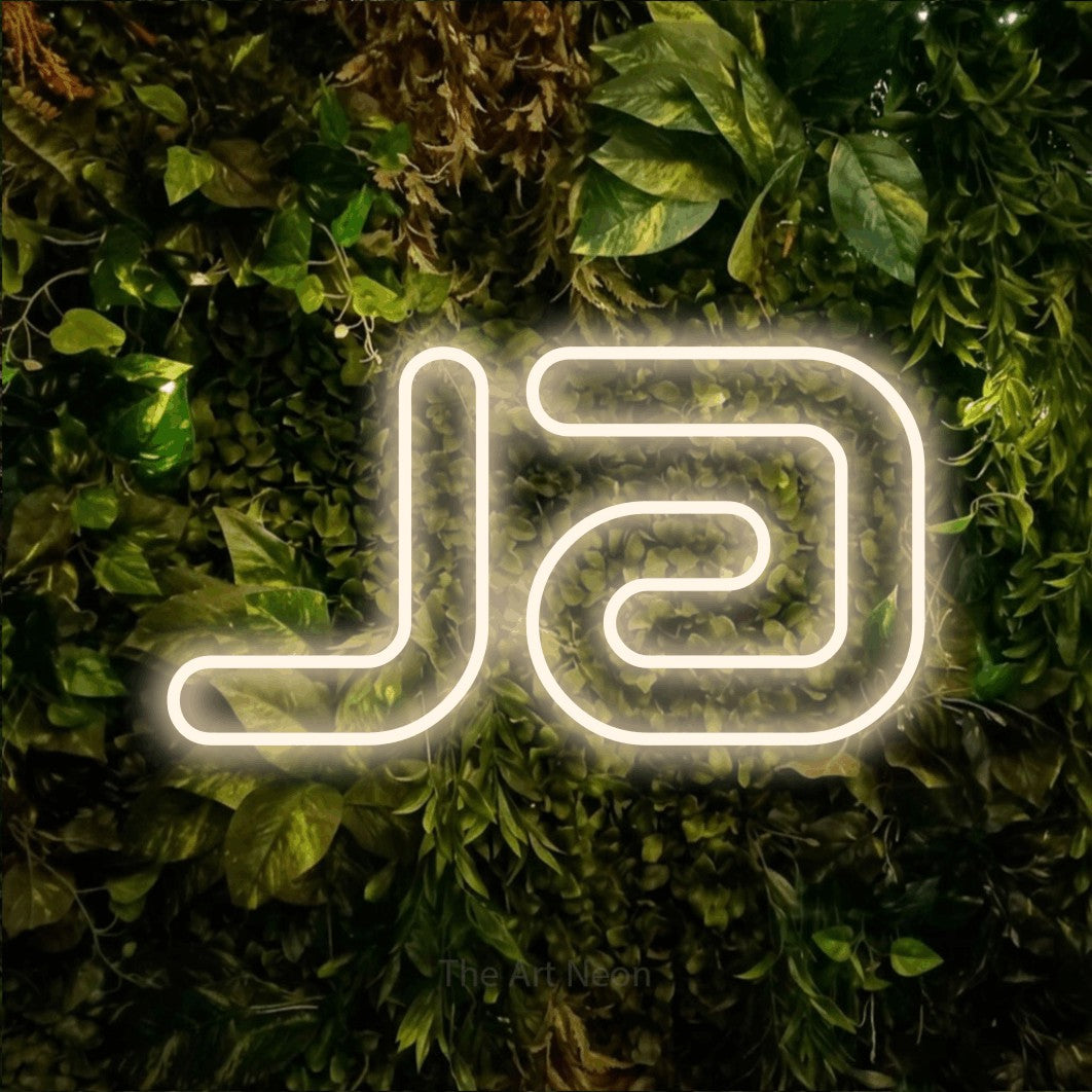 LED neon sign reading “ja”, arranged in a single line.