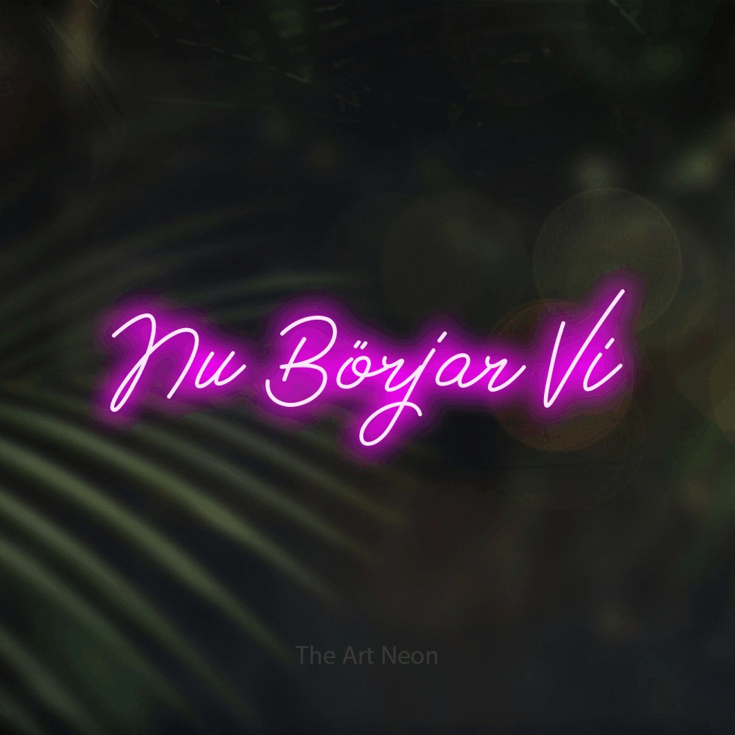 LED neon sign reading “Nu Börjar Vi”, arranged in a single line.