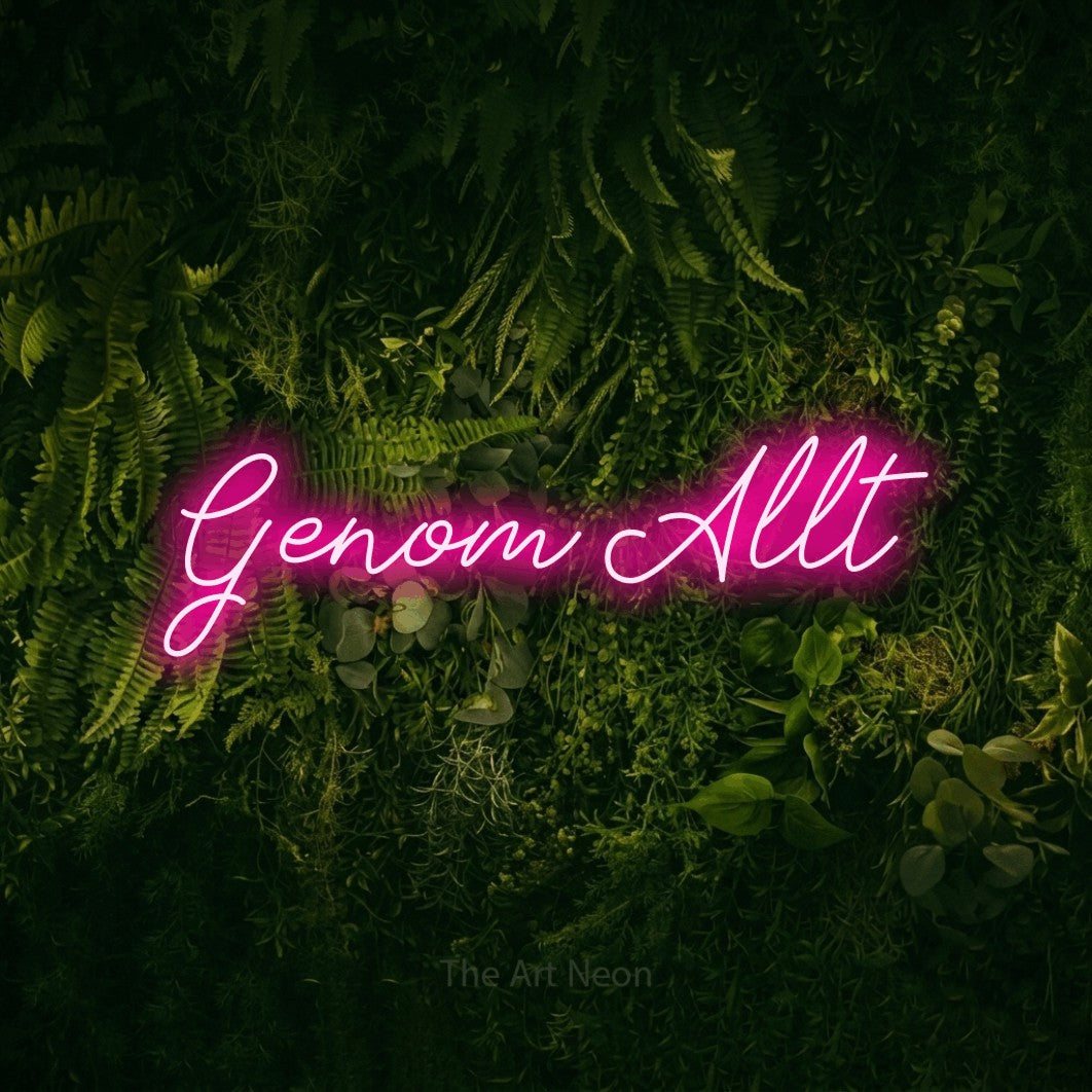 LED neon sign reading “Genom Allt”, arranged in a single line.