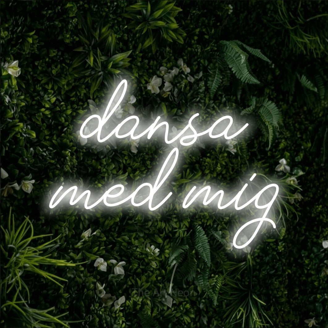 LED neon sign reading “dansa med mig”, arranged in 2 lines.