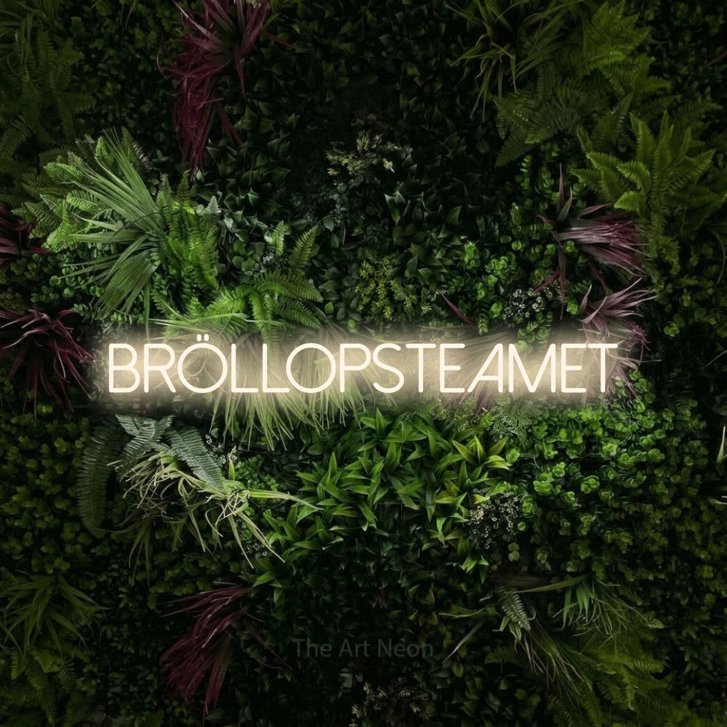 LED neon sign reading “Bröllopsteamet”, arranged in a single line.