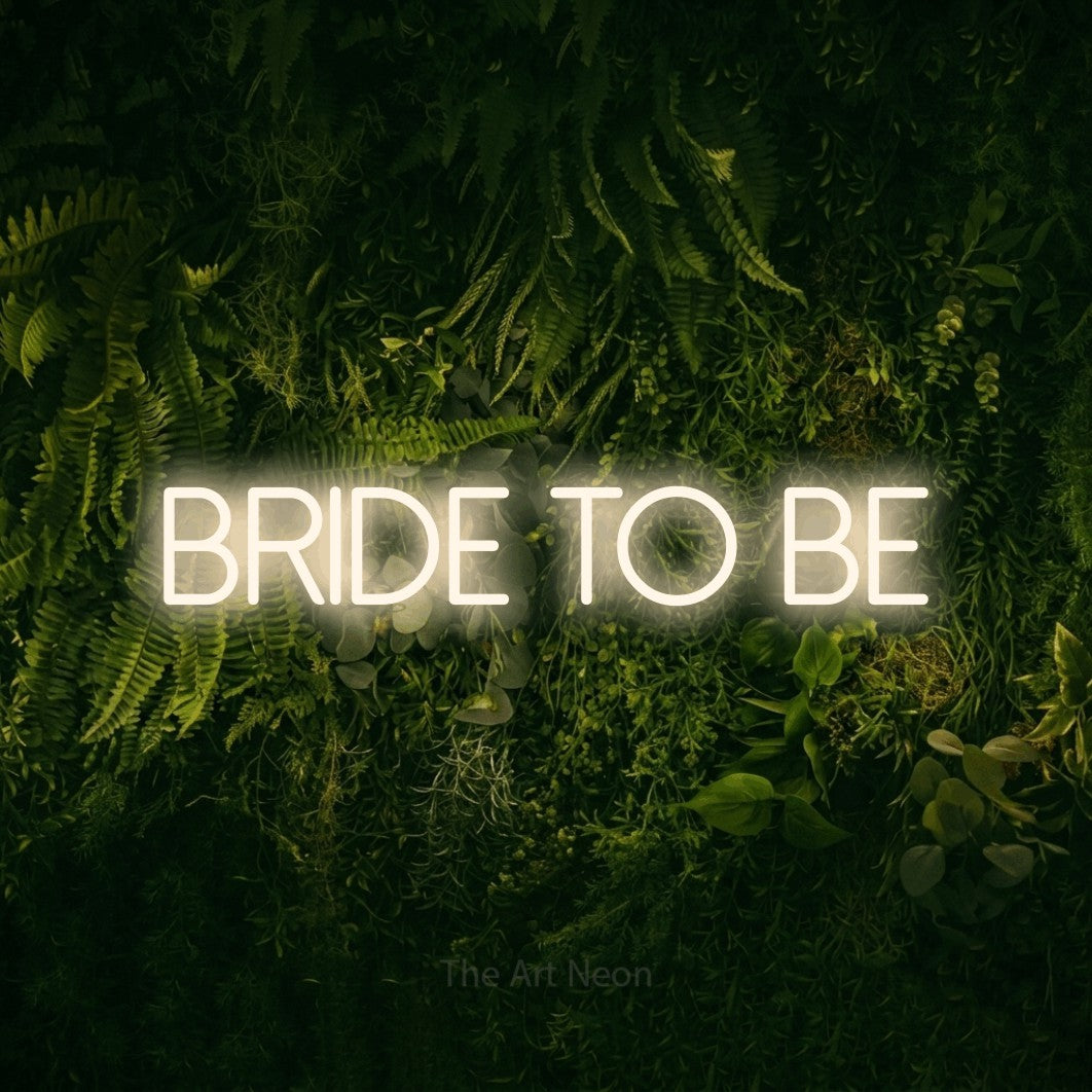 LED neon sign reading “BRIDE TO BE”, arranged in a single line.