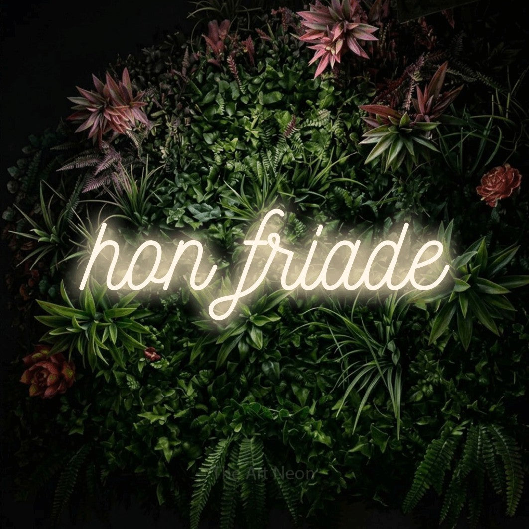 LED neon sign reading “hon friade”, arranged in a single line.