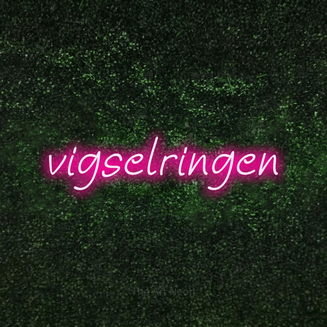LED neon sign reading “vigselringen”, arranged in a single line.