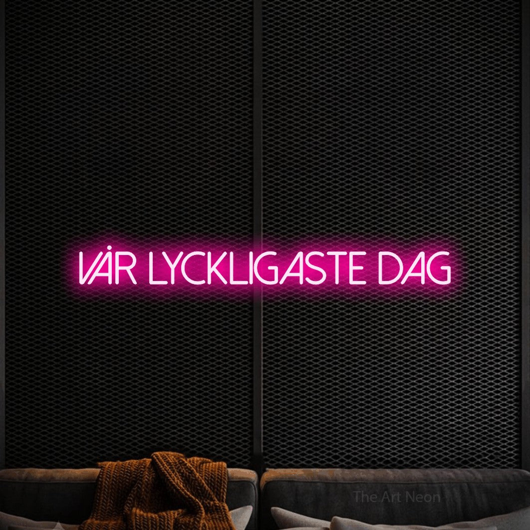 LED neon sign reading “VÅR LYCKLIGASTE DAG”, arranged in a single line.
