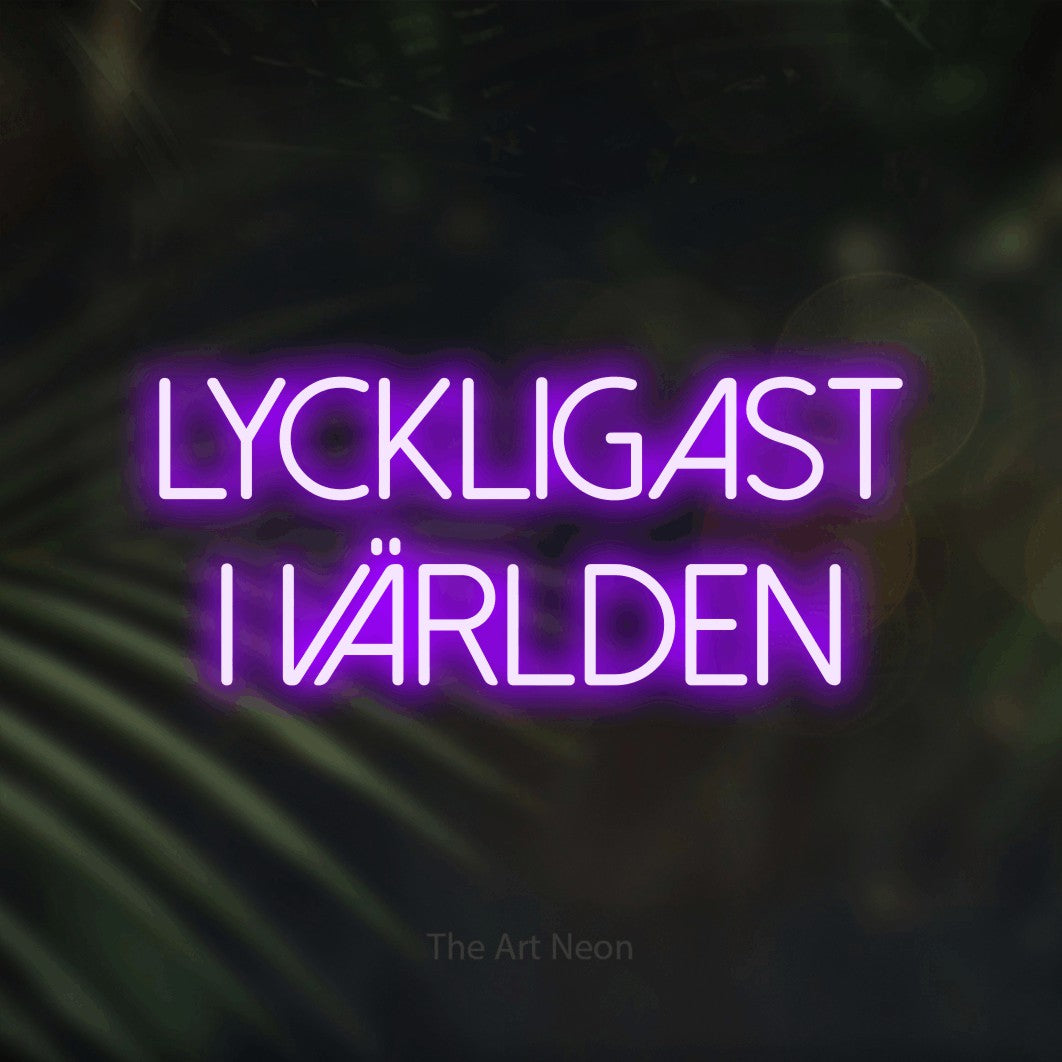LED neon sign reading “Lyckligast I Världen”, arranged in 2 lines.