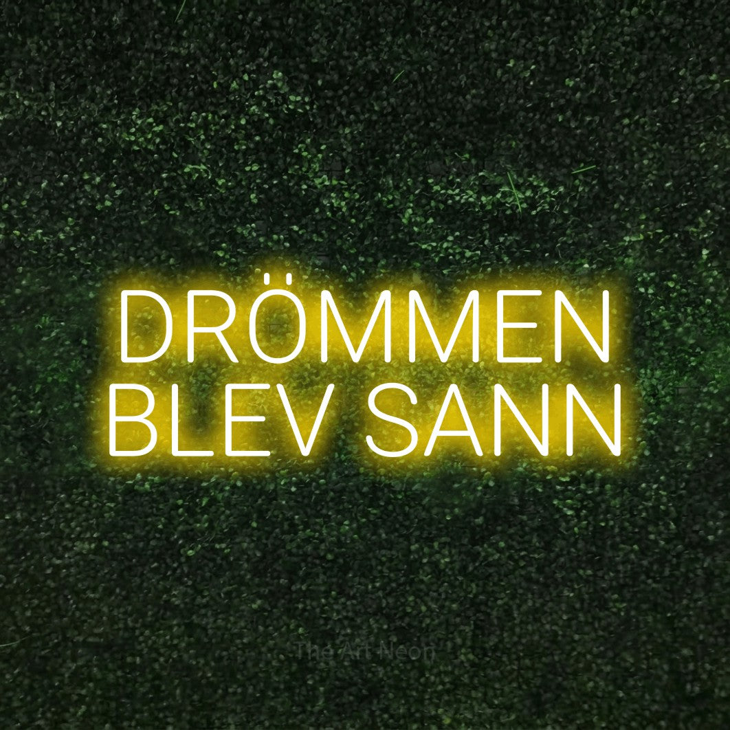 LED neon sign reading “DRÖMMEN BLEV SANN”, arranged in 2 lines.