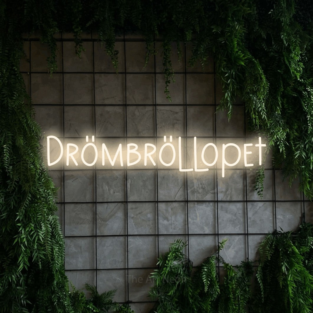 LED neon sign reading “Drömbröllopet”, arranged in a single line.