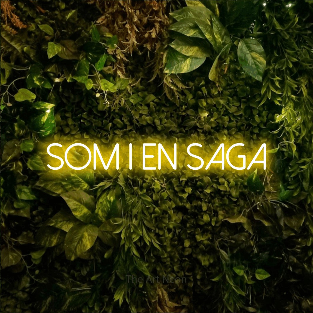 LED neon sign reading “Som I En Saga”, arranged in a single line.