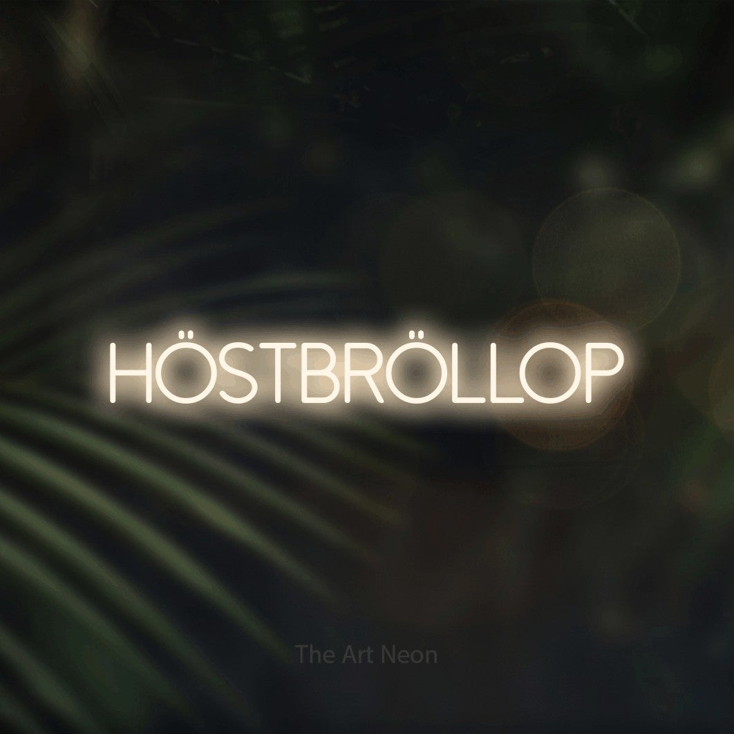LED neon sign reading “HÖSTBRÖLLOP”, arranged in a single line.