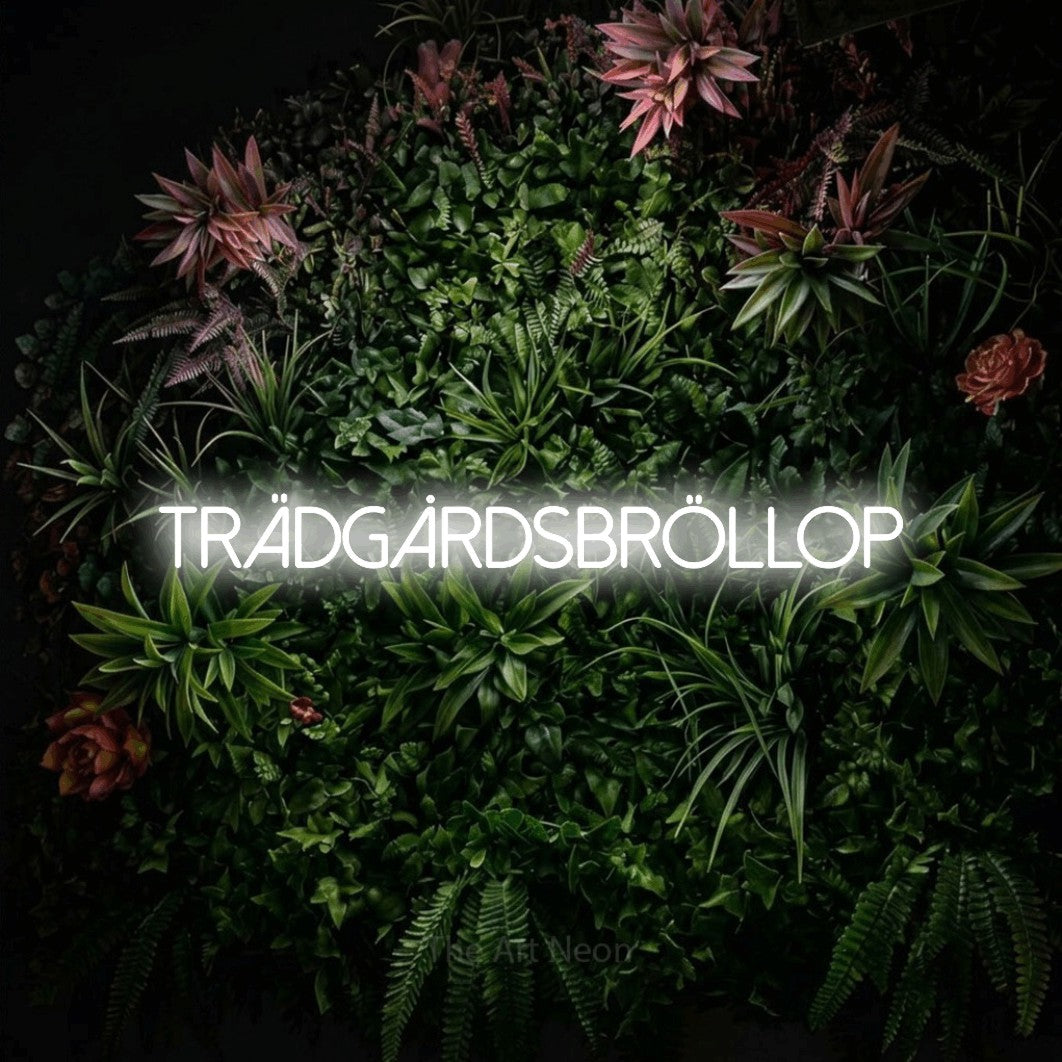 LED neon sign reading “Trädgårdsbröllop”, arranged in a single line.