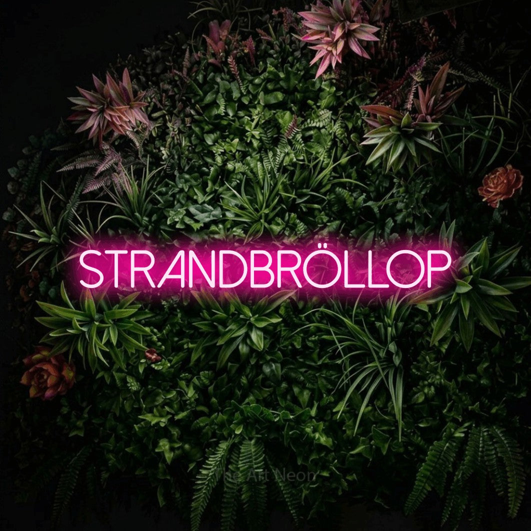 LED neon sign reading “Strandbröllop”, arranged in a single line.