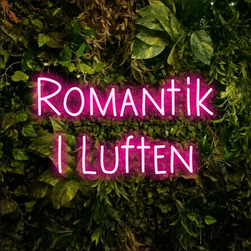 LED neon sign reading “Romantik I Luften”, arranged in 2 lines.