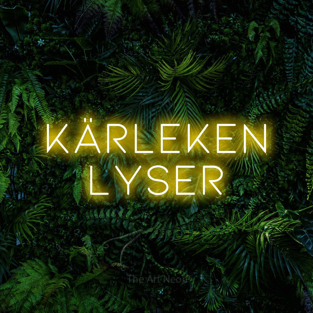 LED neon sign reading “KÄRLEKEN LYSER”, arranged in 2 lines.