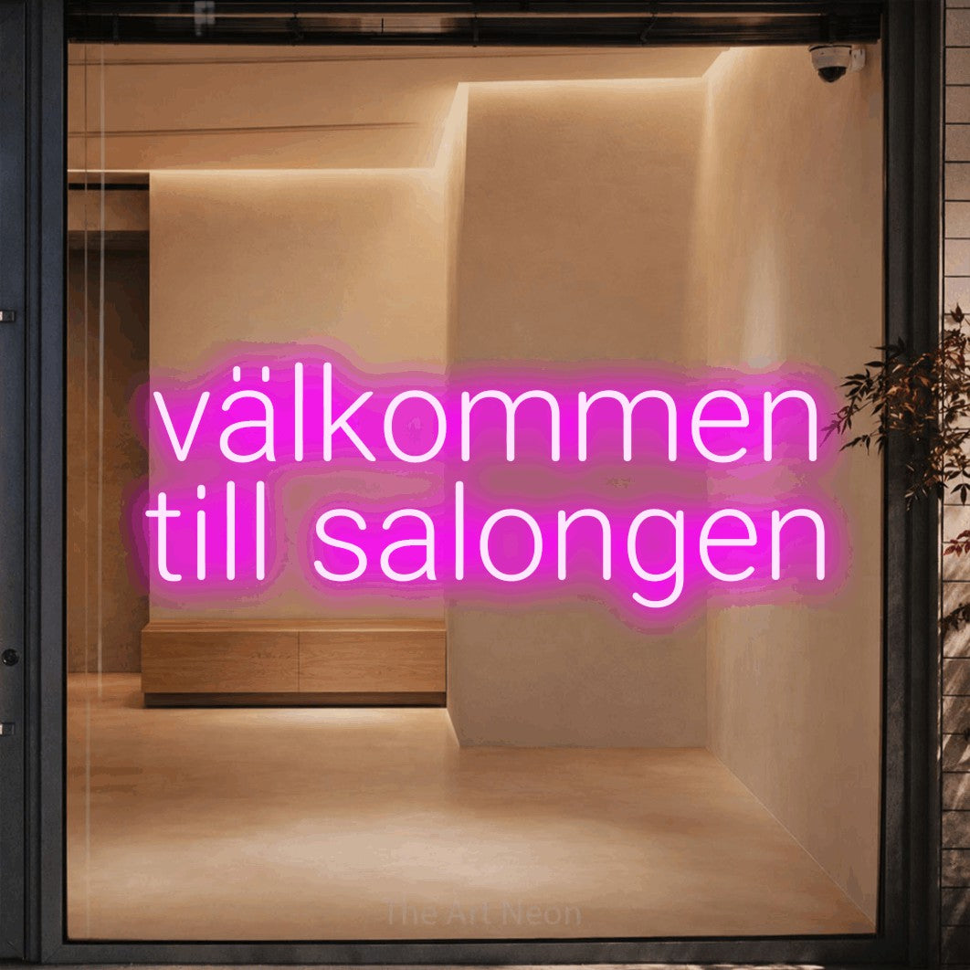 LED neon sign reading “välkommen till salongen”, arranged in 2 lines.