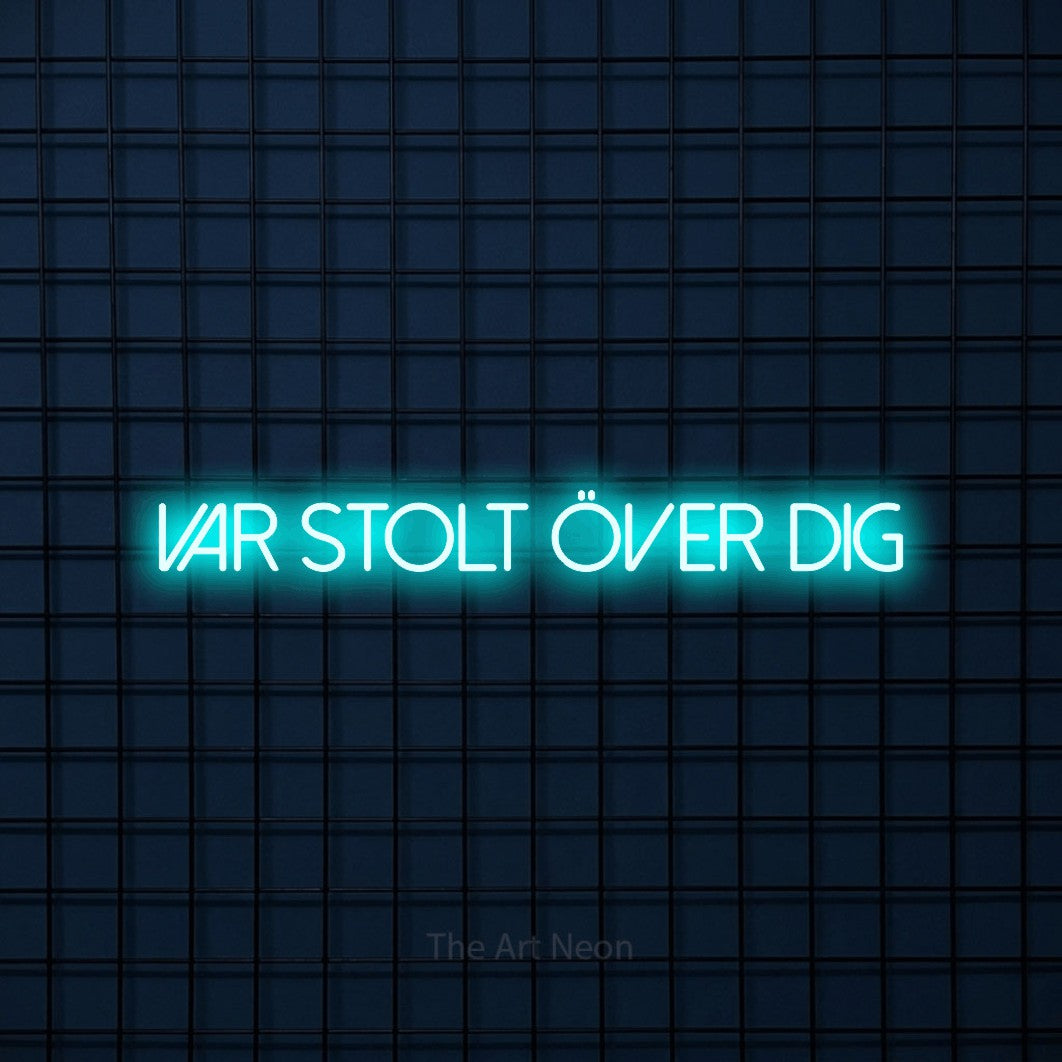 LED neon sign reading “var STOLT över dig”, arranged in a single line.