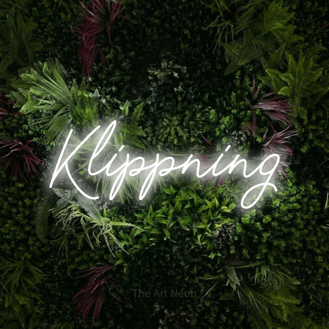 LED neon sign reading “Klippning”, arranged in a single line.