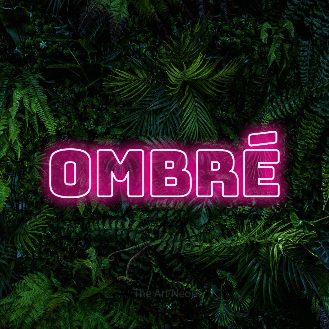 LED neon sign reading “Ombré”, arranged in a single line.