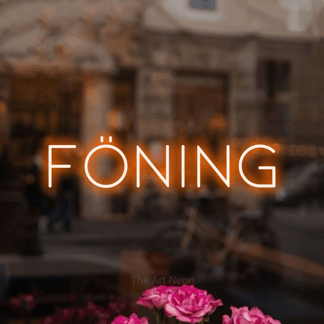 LED neon sign reading “FÖNING”, arranged in a single line.