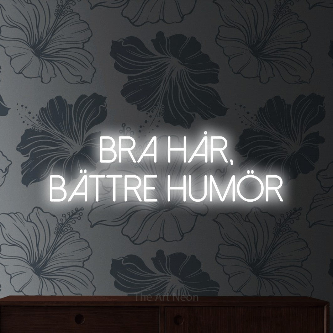 LED neon sign reading “bra hår, bättre humör”, arranged in 2 lines.