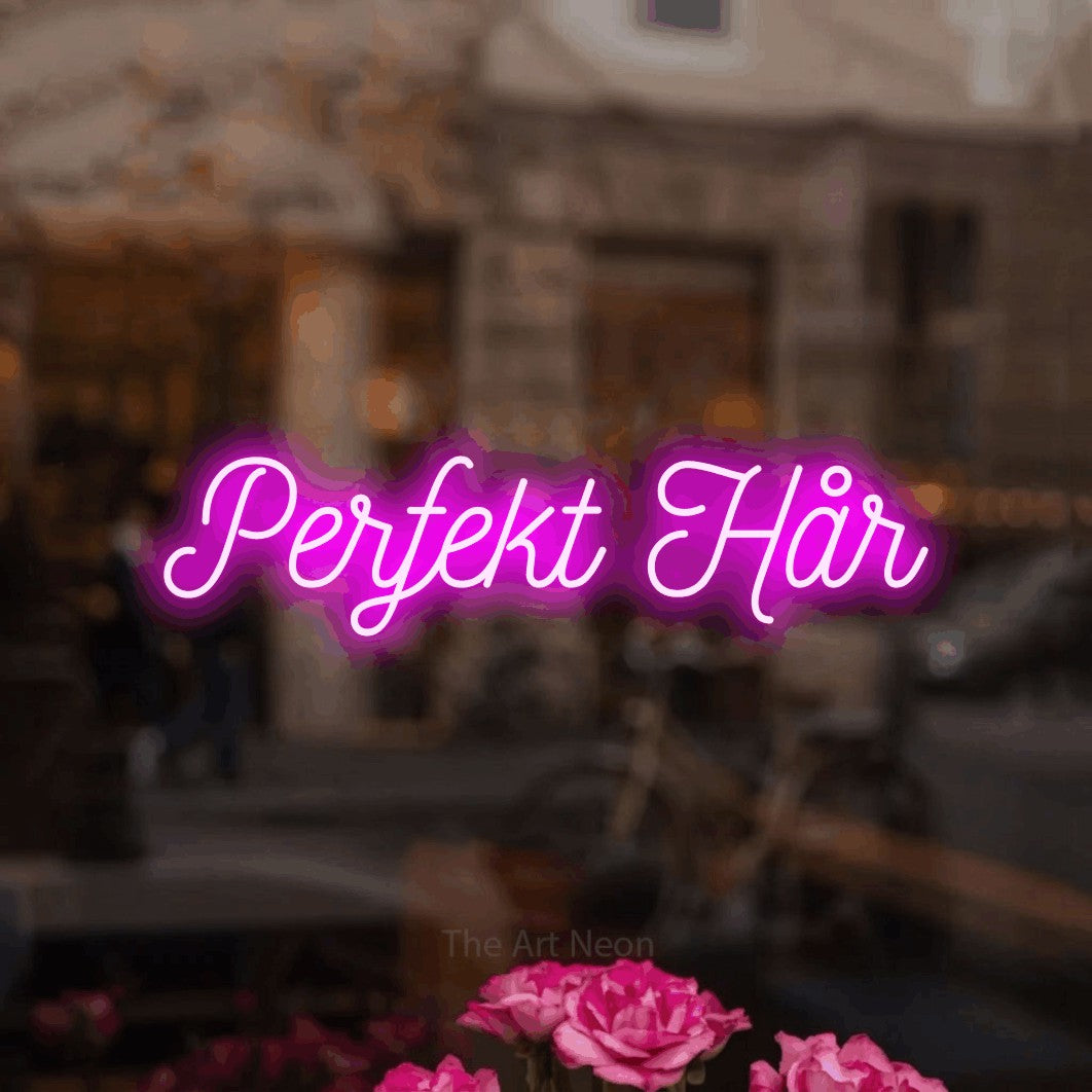 LED neon sign reading “Perfekt Hår”, arranged in a single line.