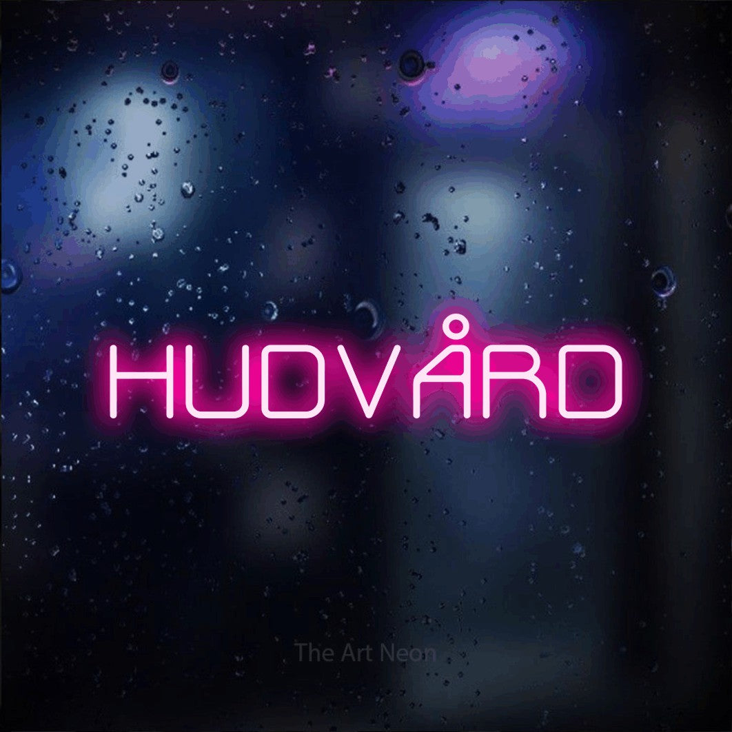 LED neon sign reading “HUDVÅRD”, arranged in a single line.