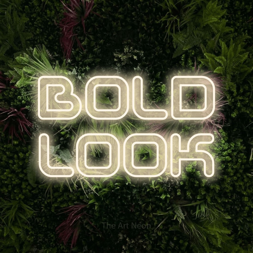 LED neon sign reading “BOLD LOOK”, arranged in 2 lines.