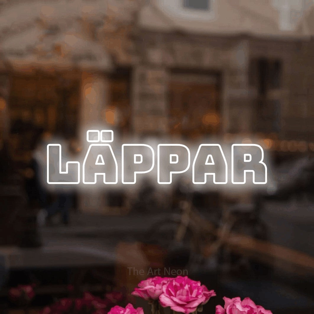 LED neon sign reading “LÄPPAR”, arranged in a single line.