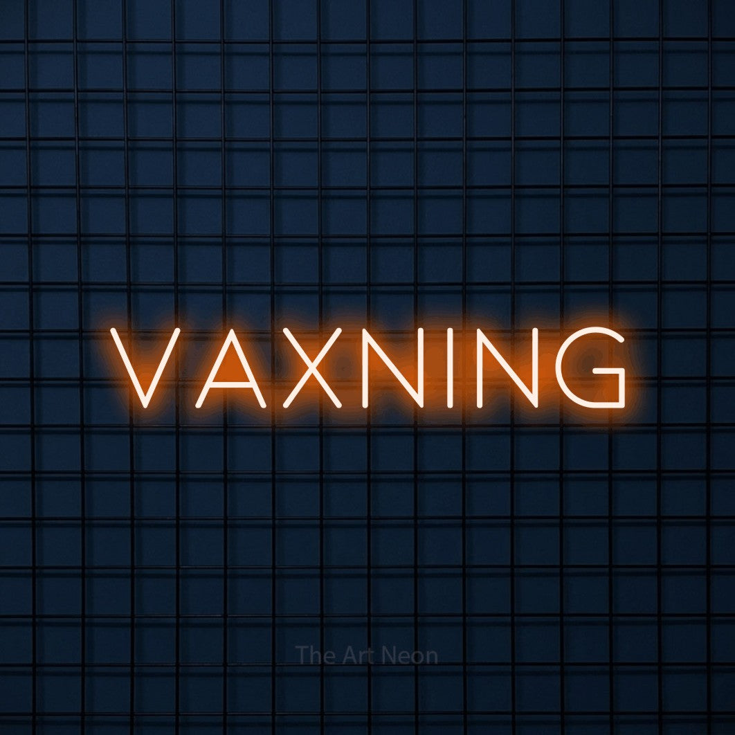 LED neon sign reading “VAXNING”, arranged in a single line.