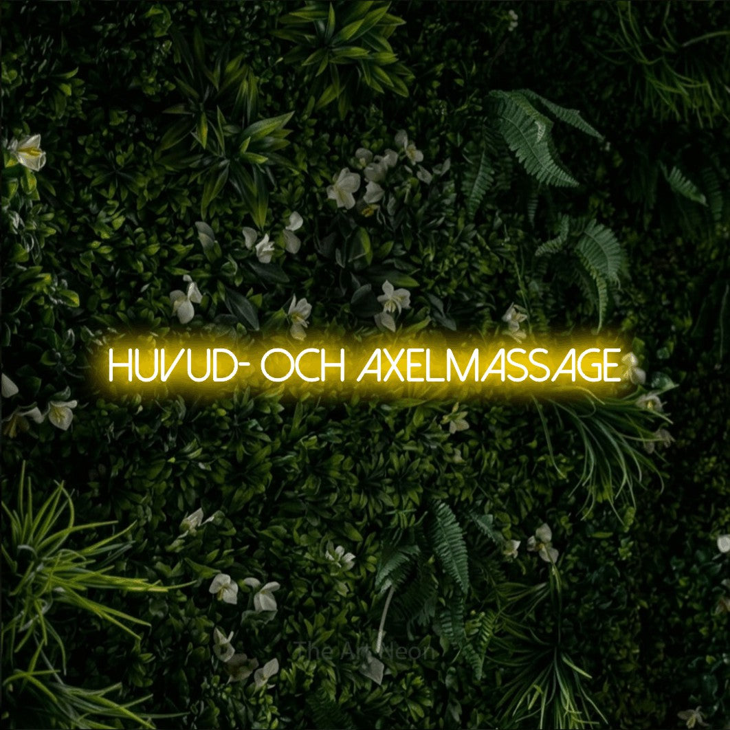 LED neon sign reading “huvud- och axelmassage”, arranged in a single line.