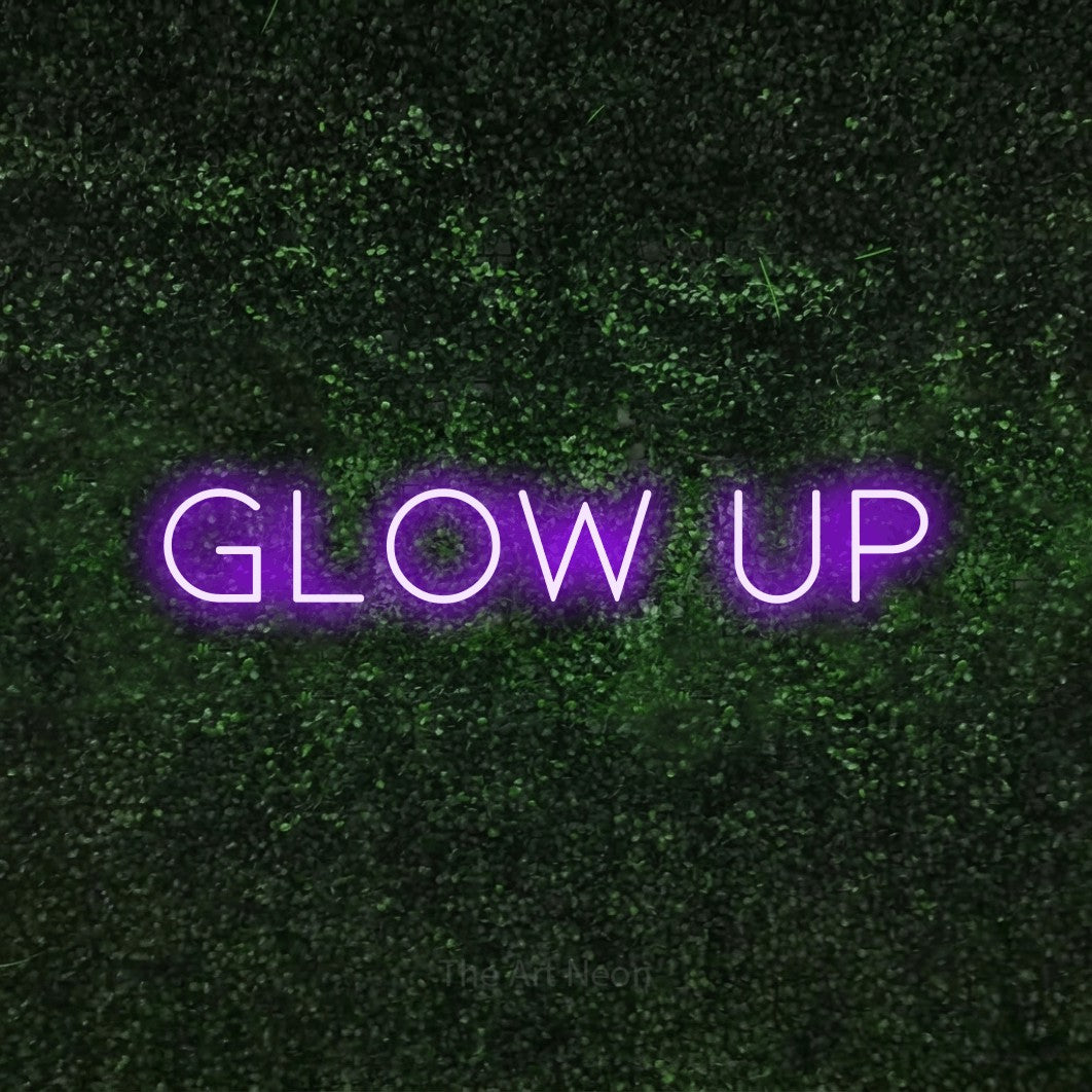 LED neon sign reading “Glow Up”, arranged in a single line.