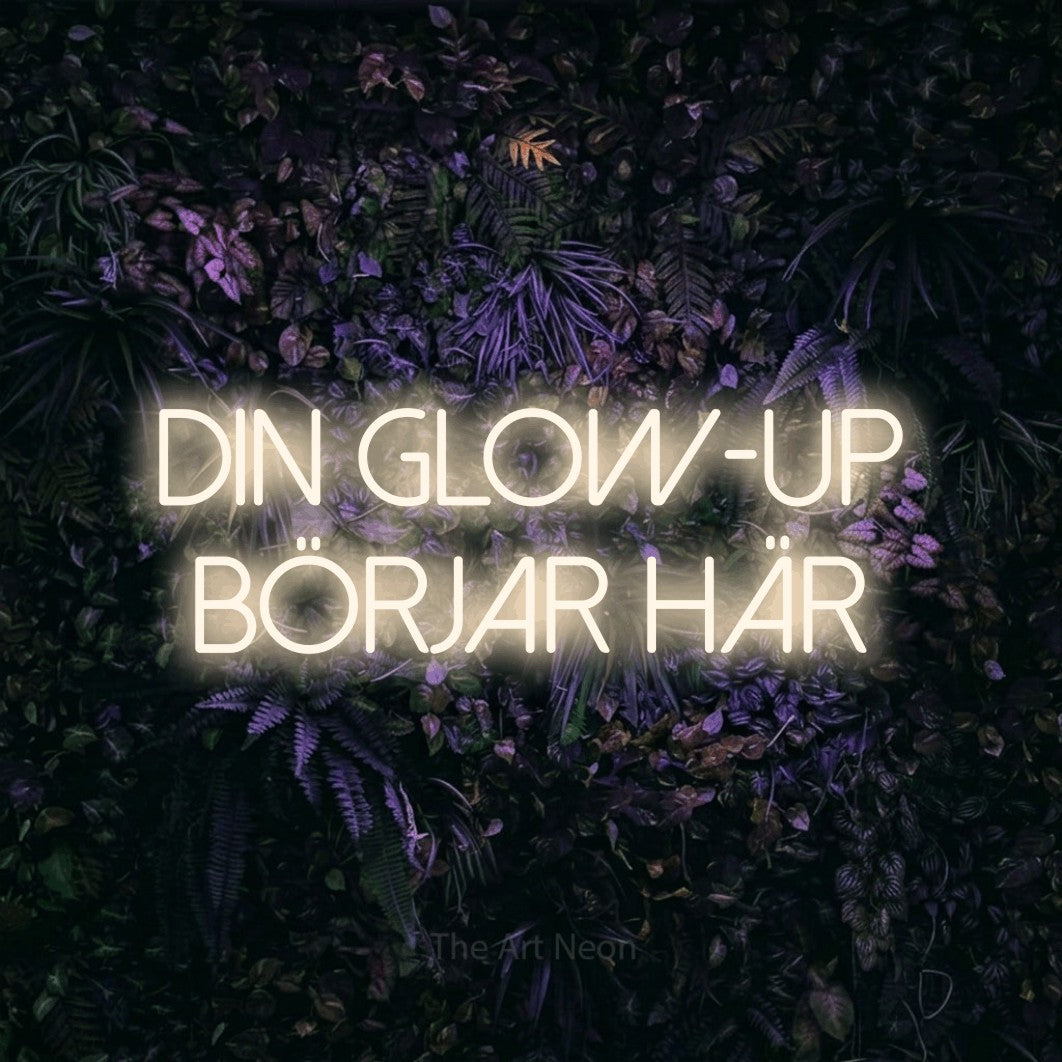 LED neon sign reading “din glow-up BÖRJAR här”, arranged in 2 lines.