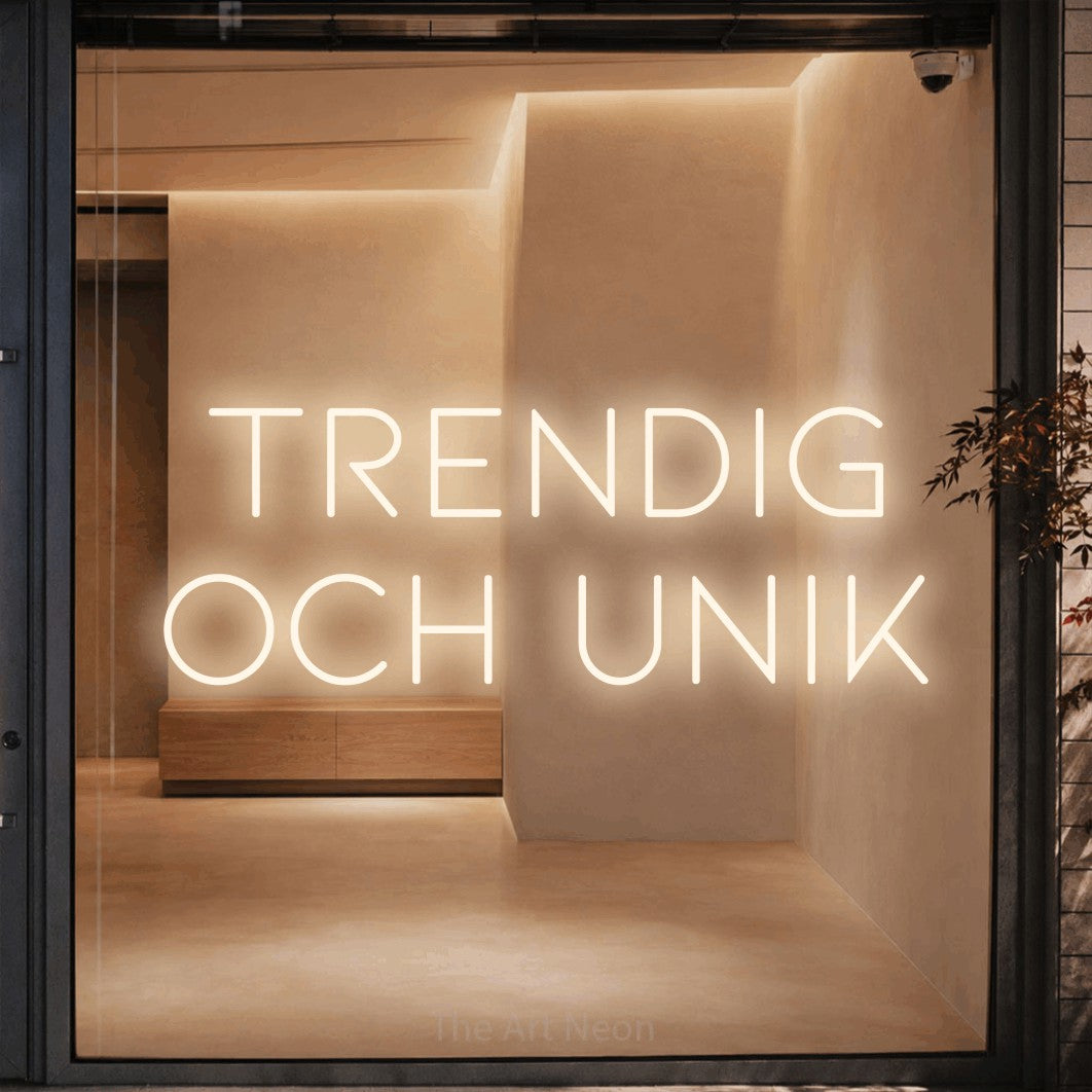 LED neon sign reading “TRENDIG och unik”, arranged in 2 lines.